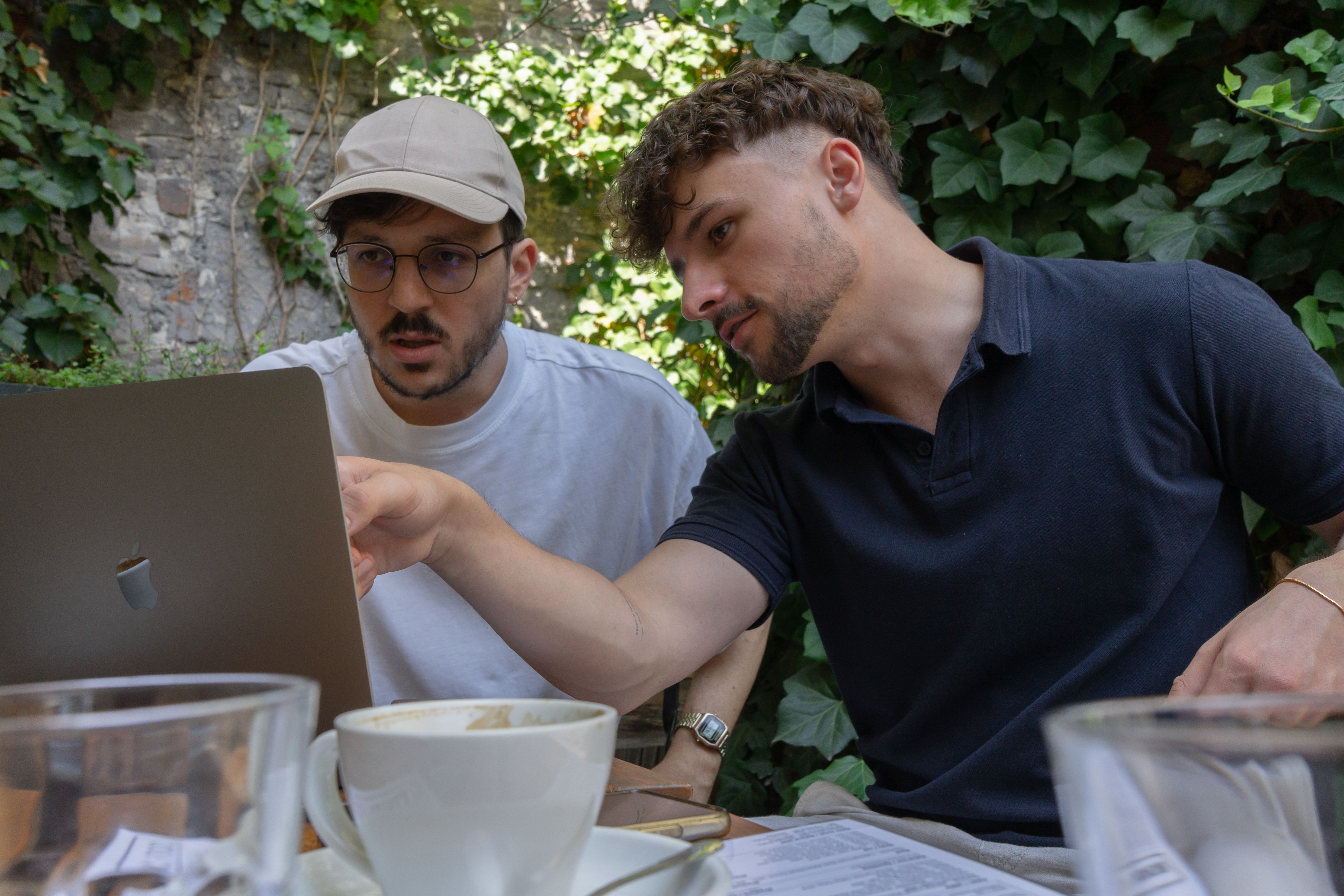 Two of the Once Advertisements employees, Kristof Menesi, and Gergo Mezes sitting in ‘Lumen Café’ in Hungary.